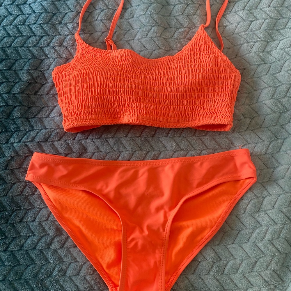 Bright orange two piece bathing suit